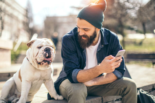 istock Man and dog in the park 934111140