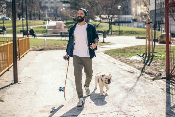 istock Man and dog in the park 934111144