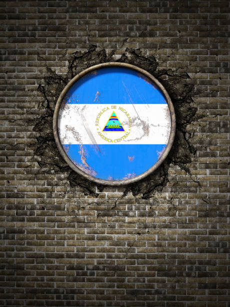 istock Old  Nicaragua flag in brick wall 934111414