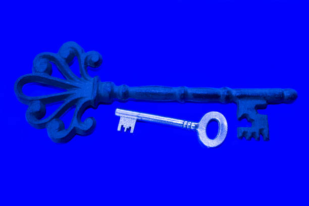 istock Old and chrome keys on the blue background 934114346