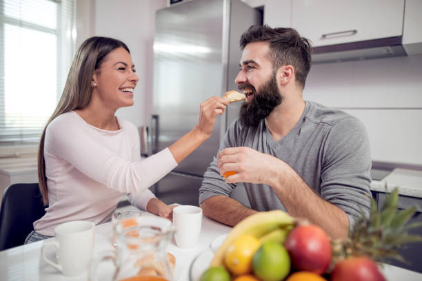 istock Couple having breakfast in the morning 934120302