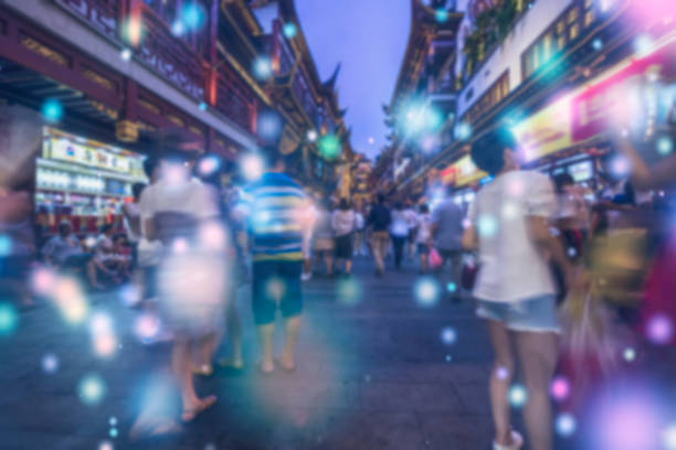 Abstract blurred people socializing during shanghai yuyuan garden at night