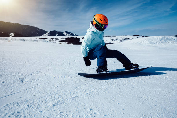 istock one snowboarder snowboarding in winter mountains 934123136