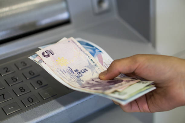 istock Withdraw money from the atm 934138988