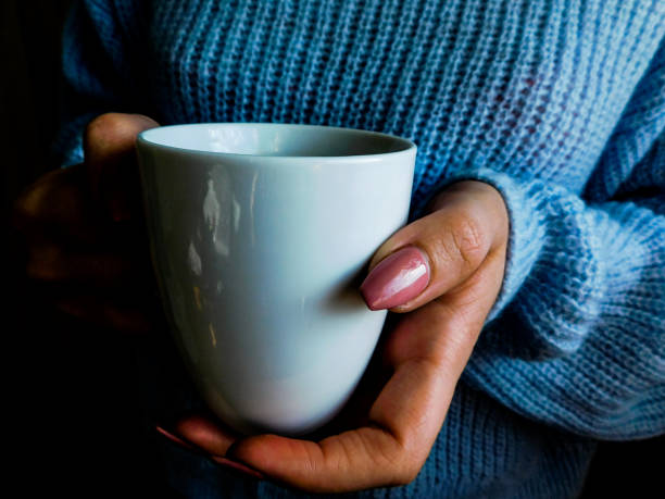 istock Cup of coffee in your hands 934153240