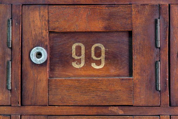 istock Close up Old wooden Post Box with number 99 934153564