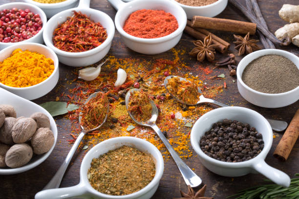 istock Herbs and spices in ceramic bowls. 934170852