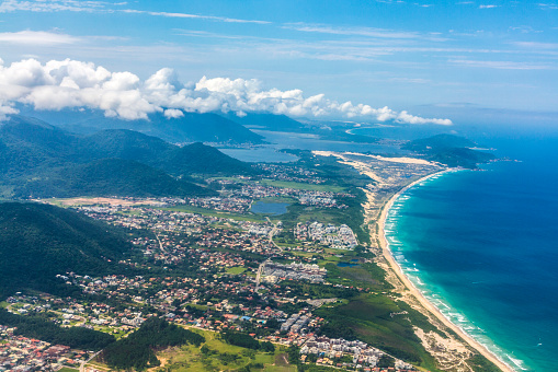 aerial view of town of Florianapolis with beach and mountains