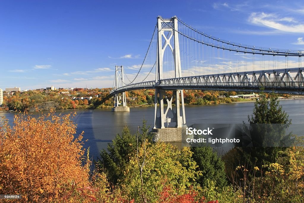 Hudson bridge during the autumn for drivers and cars Mid Hudson Bridge on a fine fall day looking across the Hudson River from Highland to Poughkeepsie, New York Hudson Valley Stock Photo