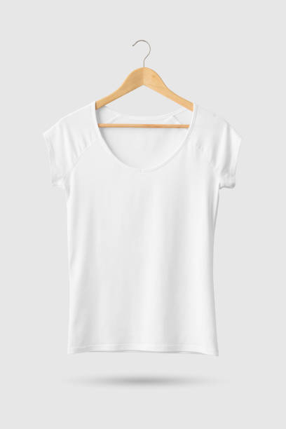 istock Blank White Women's T-Shirt Mock-up on wooden hanger, front side view. 934203012