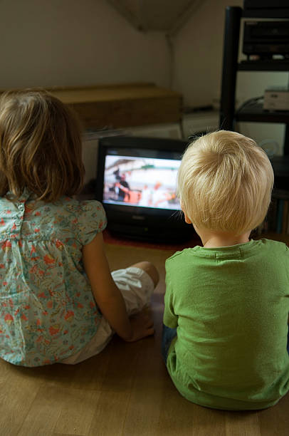 istock brothers and sisters watching television 93420824