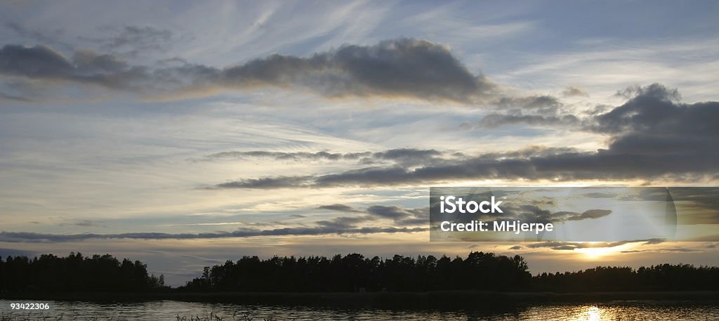 Cloudy sunset  Blue Stock Photo