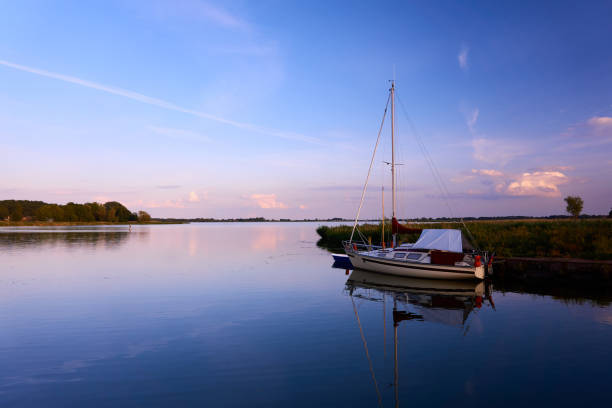 peaceful evening with boat on lake