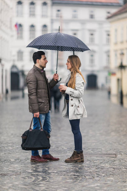 istock Friends outdoors on a rainy day 934233152