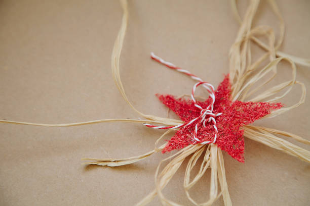 istock decoration - red homemade star and rope. 934233556
