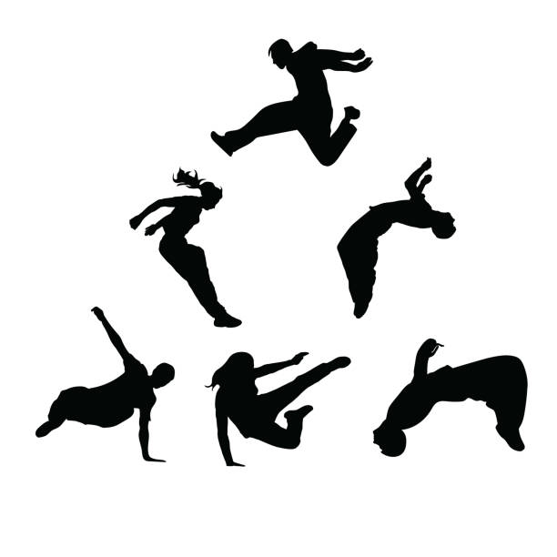 Silhouettes. Parkour Silhouettes of people engaged in parkour. Sports guys and girls. Vector silhouettes on white background. free running stock illustrations