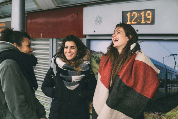 istock Female friends waiting for the tram 934255596