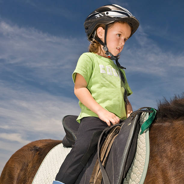 istock Little Girl on Horseback 93425719