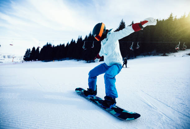 istock one snowboarder snowboarding in winter mountains 934258868