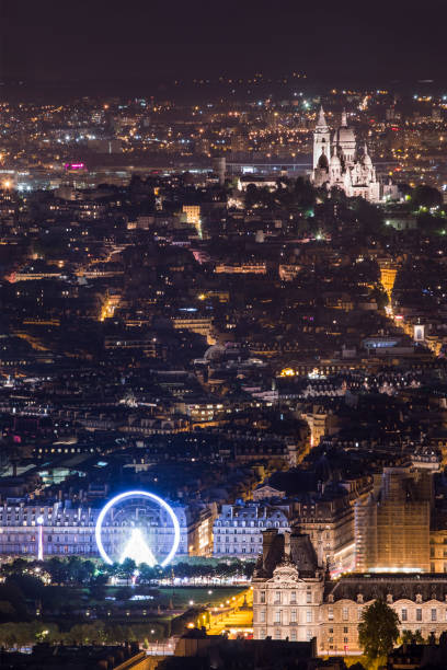 istock Glowing Paris city in nigh time 934259320