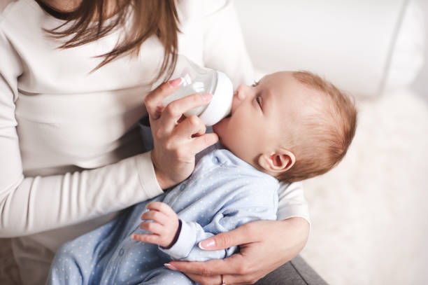 istock Mother feeding baby 934259334