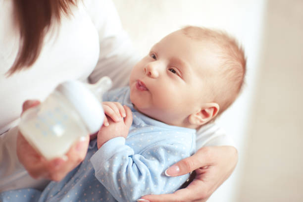 istock Mother feeding baby 934259384