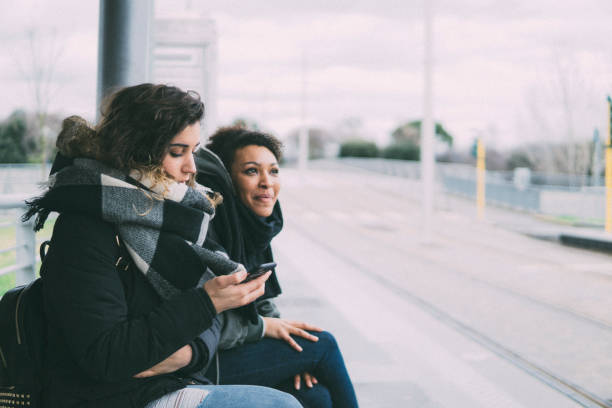istock Female couple waiting for the tram 934261564
