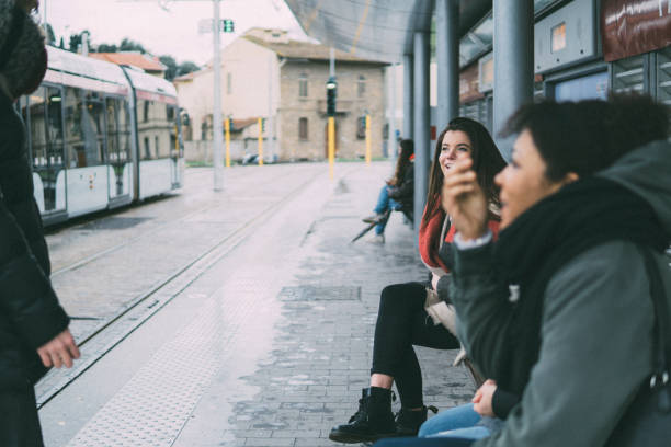 istock Female friends waiting for the tram 934261840