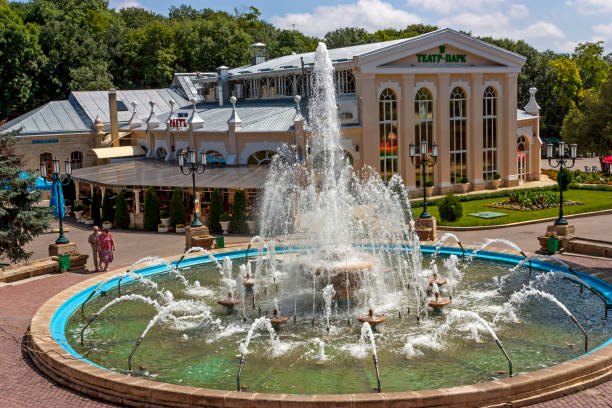 Yessentuki, Russia - July 07, 2016: View of the old fountain  in Yessentuki, resort town in Caucasian Mineral Waters, Russia.Inscription on the building: theater - park
