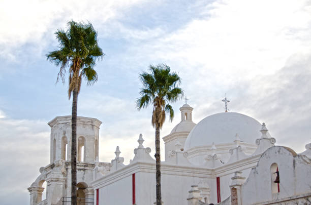 San Xavier del Bac Mission The San Xavier del Bac Mission stands on the Tohono O'odham Indian Reservaton near Tucson, Arizona. tohono o'odham stock pictures, royalty-free photos & images