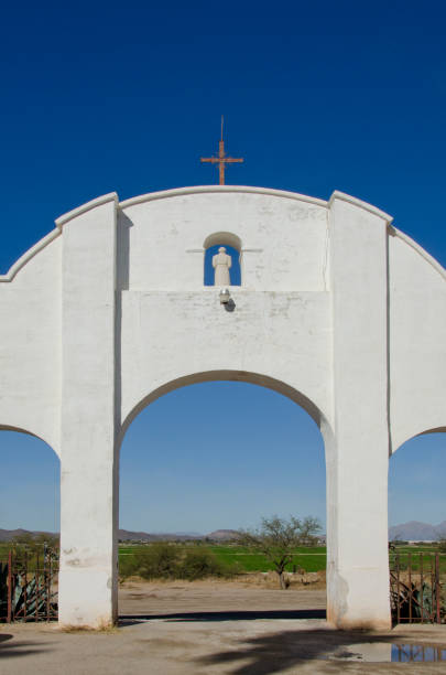 The back of San Xavier del Bac Mission The San Xavier del Bac Mission stands on the Tohono O'odham Indian Reservaton near Tucson, Arizona. tohono o'odham stock pictures, royalty-free photos & images