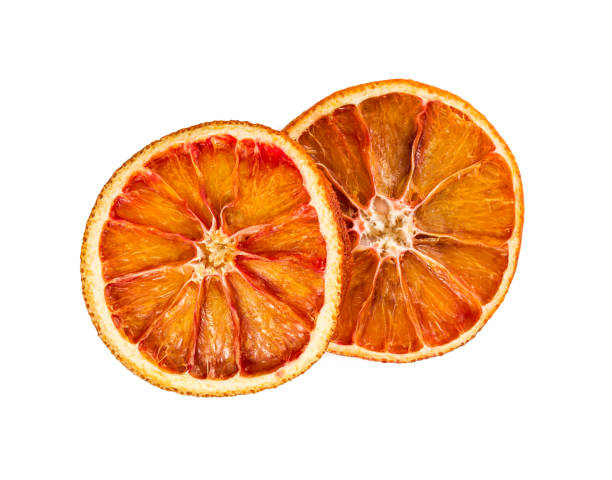 istock Two dried orange slices isolated on white background. 934264756
