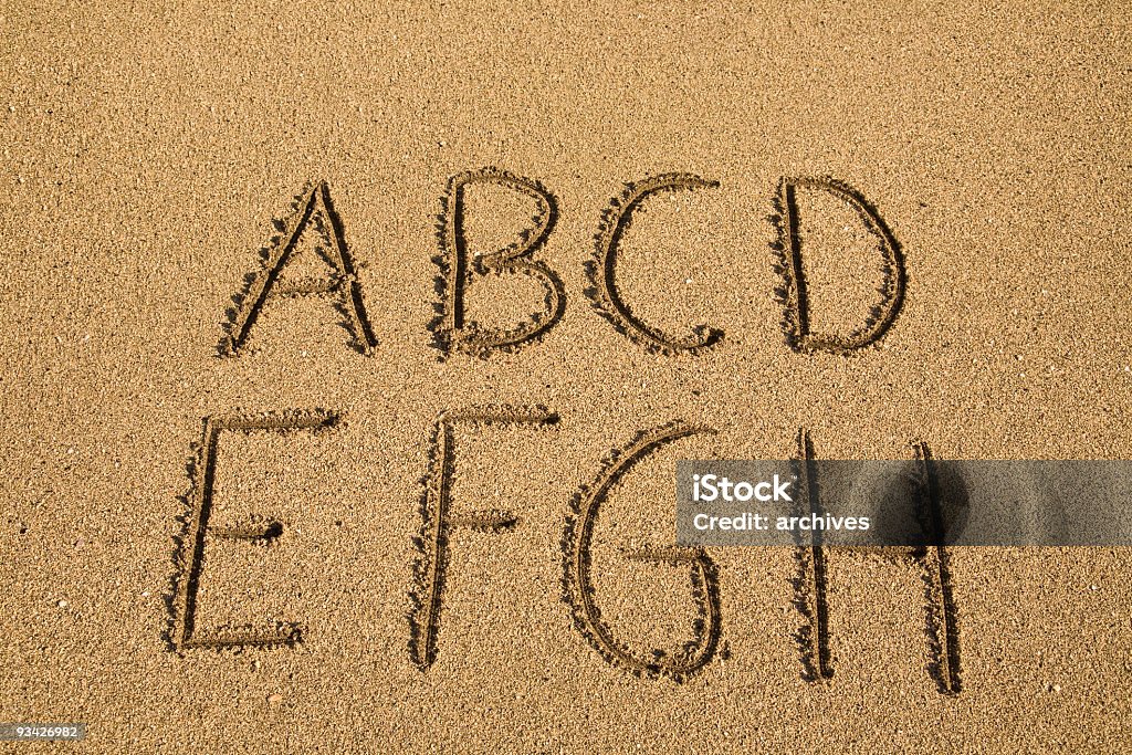 Alfabeto de arena - Foto de stock de Aire libre libre de derechos