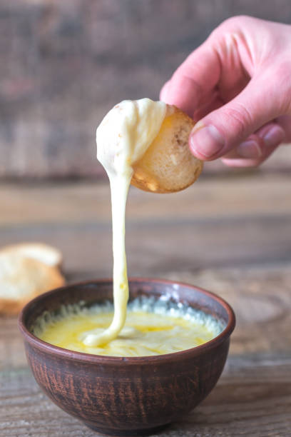 istock Bowl of cheese dip with toasts 934274136
