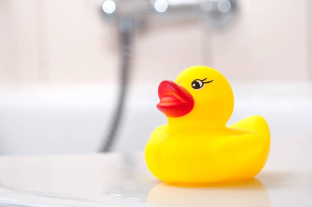 istock Yellow rubber duck toy on bath 934274400