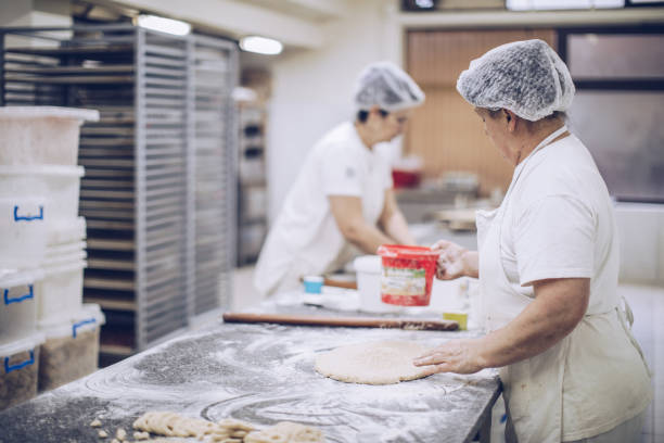 istock Women making food in bakery 934279878