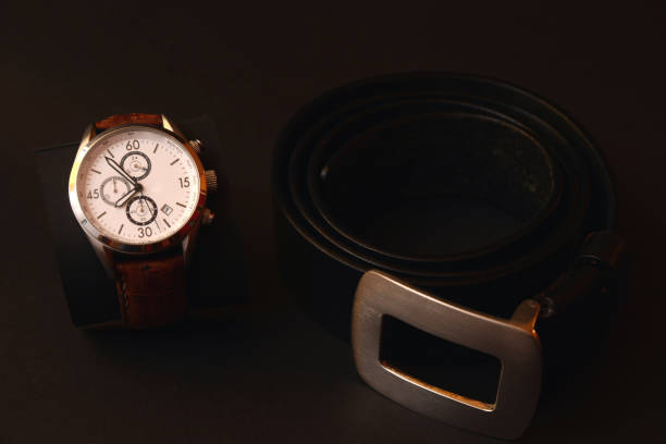 istock Mens luxury wristwatch and black belt 934280160