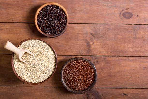 istock Black , white and red quinoa in spoon 934280598