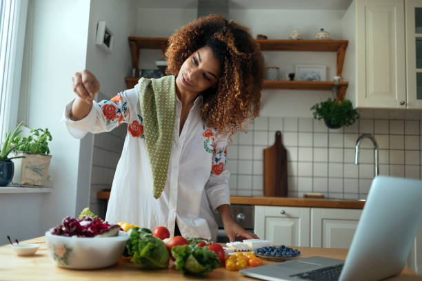istock Seasoning the salad 934286134
