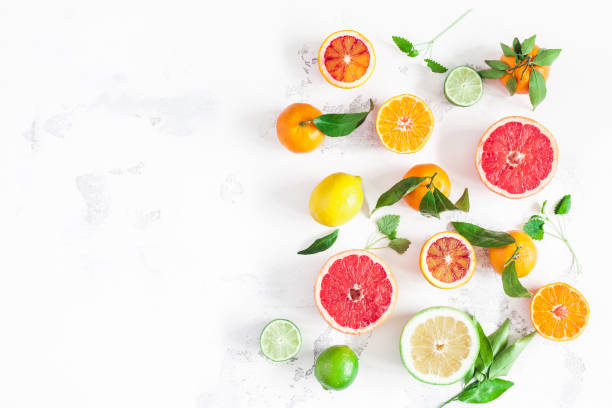 istock Colorful fresh fruits on white table. Flat lay, top view 934286516