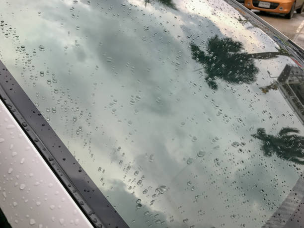 istock water drop and back glass windshield of the car 934289630