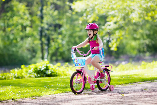 istock Child riding bike. Kid on bicycle. 934292644