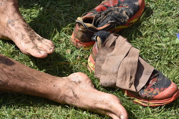 istock A man removed shoes full of mud 934295992