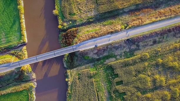 istock Aerial view of the road over a river 934298964