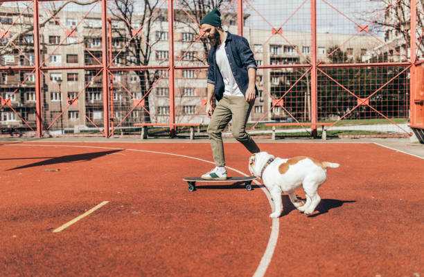 istock Man and dog in the park 934306984