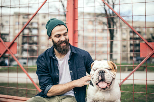 istock Man and dog in the park 934307348
