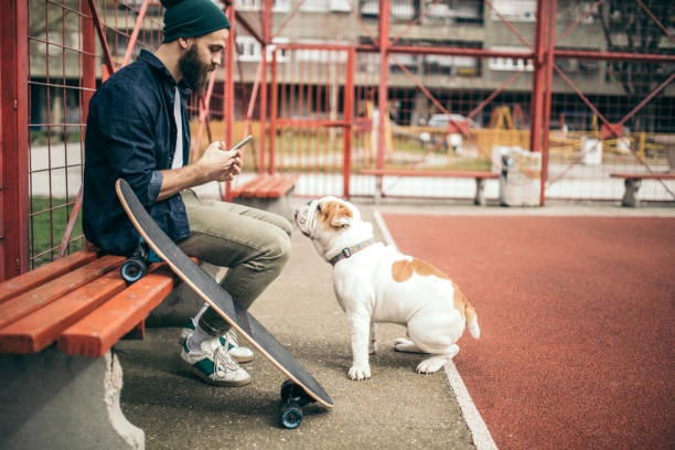 istock Man and dog in the park 934307644