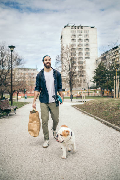 istock Man and dog in the park 934310174
