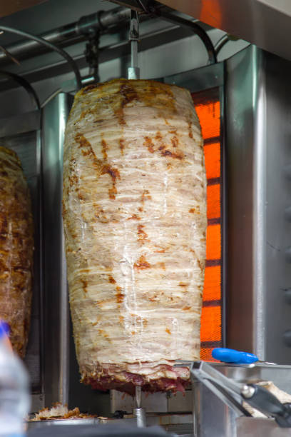 istock Traditional Greece gyros on the rotating fireplace 934313144