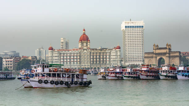 Awesome view of Hotel Taj & Gate way of India with boats on sea looking beautiful. stock photo